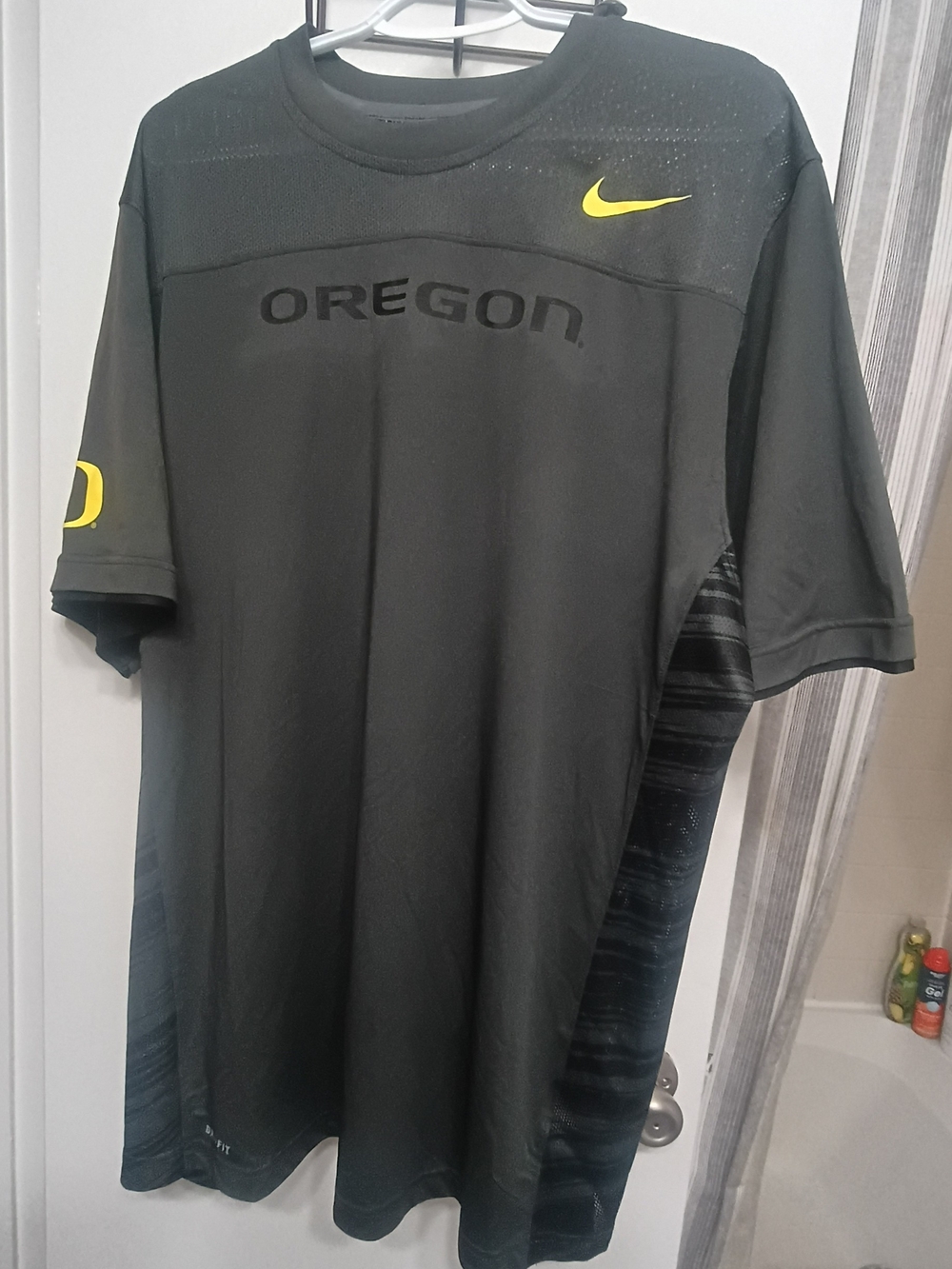 Nike Black Short-Sleeve Oregon Performance Tee with Yellow Swoosh